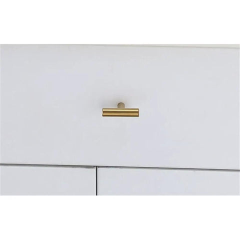 Single brass finish zinc alloy T bar drawer pull on white cabinet, part of 10 pack for cabinets and doors rust resistant with smooth edges.