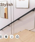 Heavy Duty Black Wrought Iron Stair Railing With Sick Super Grippy Treads For Indoor Outdoor All Weather Home Safety No Sweat Mount For Attic Porch Deck mounted on stylish staircase, showcasing sleek design.
