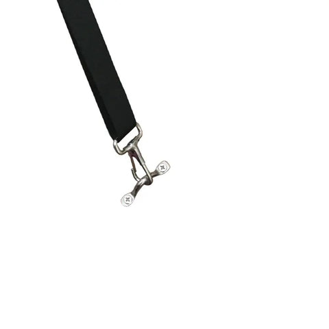 Close-up of 316 stainless steel pad eye strap in use on a black strap, part of Eight Pack 316 Stainless Steel Pad Eye Straps Deck Loops For Bimini Boat Tops And Kayaks Includes 16 Screws Accepts Up To Three Eighths Inch Lanyards And Ropes Rustproof Marine Tie Down Hardware.