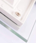 Close-up of Ultra Thin Square Recessed LED Downlight Kit showing screw detail and glass panel trim for lighting installation.
