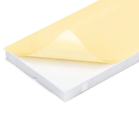 Peeling adhesive sheet on a breadboard from 10 Piece Breadboard Kit With 830 Point Solderless Prototyping Boards MB 102 For Arduino Projects