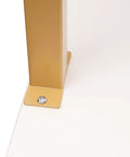 Close-up of Industrial Style Wall Mounted Desk leg in gold finish, showcasing sturdy construction for small spaces