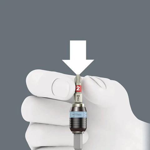 Gloved hand holding Rapidaptor bit from Stainless Bit-Check 30 Set With Rapidaptor Bit Holder And Quick Release Chuck, 29 Bits In A Compact Case