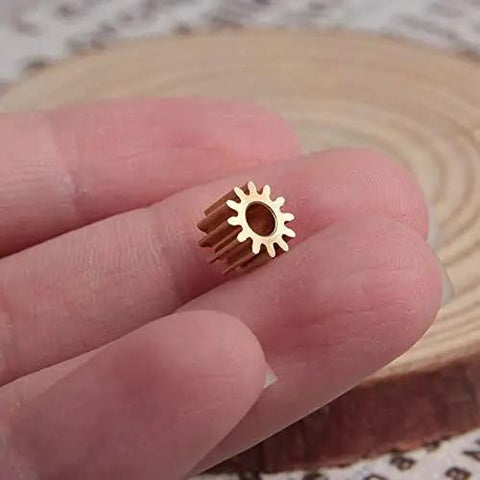 Two Pack Brass Spur Gears, 0.5 Modulus, 12 Teeth, 3mm Bore, 5mm Gear Width held between fingers