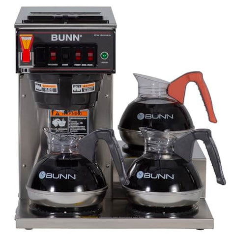 Automatic Commercial Coffee Brewer With 3 Lower Warmers 120V Delivers 3.9 Gallons Per Hour Hot Water Tap And Backup Pour Over SplashGard Deflector Stainless Steel Construction Compatible With Carafes Decanters And Airpots with three BUNN carafes on warmers.