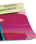 Plastic shim stock set, 10 by 20 inches, assorted translucent colors, stacked sheets.