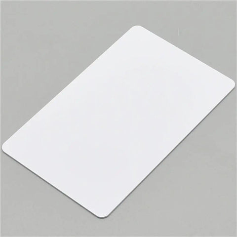 Top Shelf Two Hundred Thirty White Blank Pvc Cards Waterproof Inkjet Printable Id Business Size on a gray background.