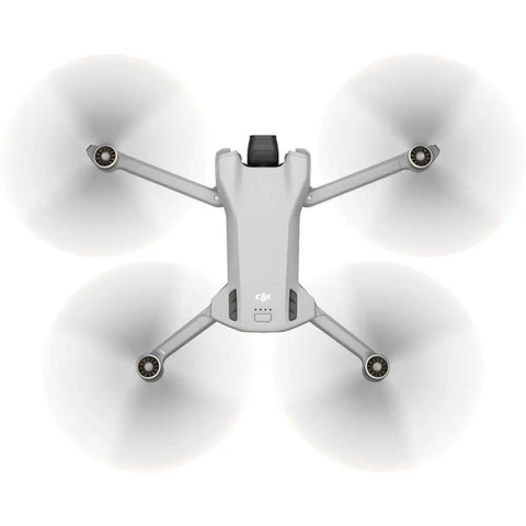 Top view of Mini 3 Drone With RC Remote Bundle Portable 4K Quadcopter Kit With 64GB Card Pro Sling Backpack Landing Pad Card Reader Cleaning Kit
