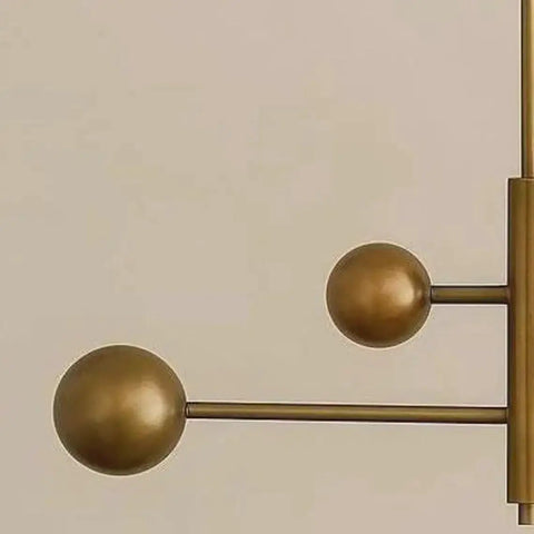 Brass Chandelier Light Fixture, Handmade Sputnik Style Modern Ceiling Light close-up of raw brass accents and spherical shapes.