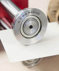 Close-up of Two Station Metal Bender Pro Grade for precise bends under 150mm, adjustable roller spacing from 0.5mm to 1mm.