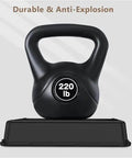 Black 220 lb kettlebell with handle, displayed on a rectangular platform, features durable construction anti-explosion design.