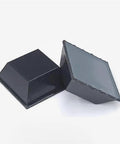 Dead Set Solid Self Adhesive Rubber Feet Pads With Super Sticky Backing Non Slip Furniture Bumpers angled view 0.78 inch square black pads