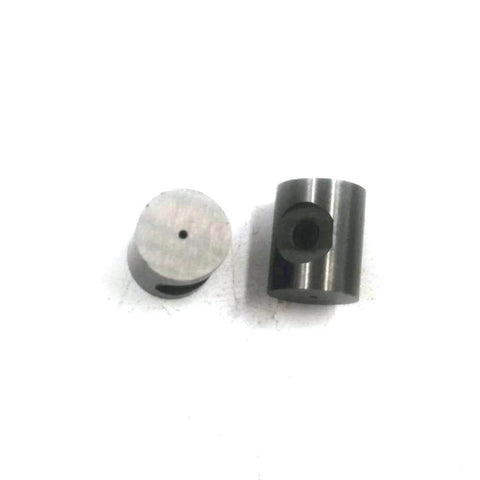 Dialine waterjet mixing chamber spare parts; two silver metal cylinders with central bores