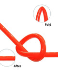 Ultra Flexible Heavy Duty Polyurethane Air Hose Tubing For Compressors And Pneumatics demonstrating flexibility with a loop on a red tube.
