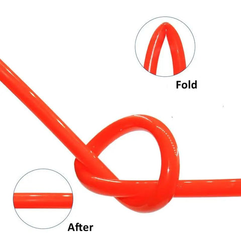 Ultra Flexible Heavy Duty Polyurethane Air Hose Tubing For Compressors And Pneumatics demonstrating flexibility with a loop on a red tube.
