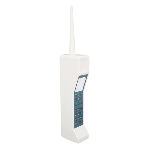 Hella Nostalgic White Retro Brick Cell Phone Model Ornament For Office Desk Decor Vintage 80S 90S Throwback Piece With Cool Industrial Vibe And Serious Charm Style Details - detailed white plastic brick phone ornament with antenna.