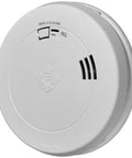 10 Year Battery Powered Photoelectric Smoke And Carbon Monoxide Detector With No Fuss Setup Easy Install Loud Alarm Low Battery Alert And Long Lasting Battery Life For Safer Homes, round white device