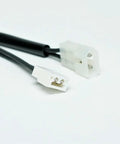 Cable connectors for furnace motor with dual white plugs and black wire, part of The Ultimate Fix For Your Blower With This Legit Furnace Draft Inducer Assembly Replacement Motor.