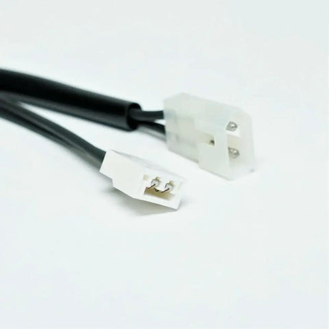 Cable connectors for furnace motor with dual white plugs and black wire, part of The Ultimate Fix For Your Blower With This Legit Furnace Draft Inducer Assembly Replacement Motor.