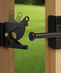 Heavy‑Duty Self‑Locking Automatic Gate Latch, Black Security Hardware for Wood and Metal Yard & Garden Fences mounted on wooden gate.