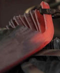 Hand Forged In Austria Traditional Craftsmanship For Harvesting Grain And Clearing Grass Durable Austrian Steel blade being forged.