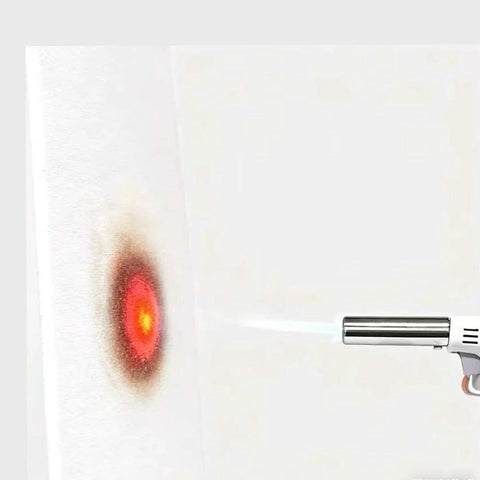 White 12x12x1/8 in ceramic fiber gasket sheet; high-temperature gasket material under blowtorch flame.