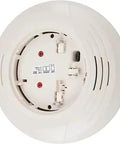 No Fuss Retrofit Ready Intelligent Sounder Base In Elegant Ivory, showing back view with connections for fire alarm systems.