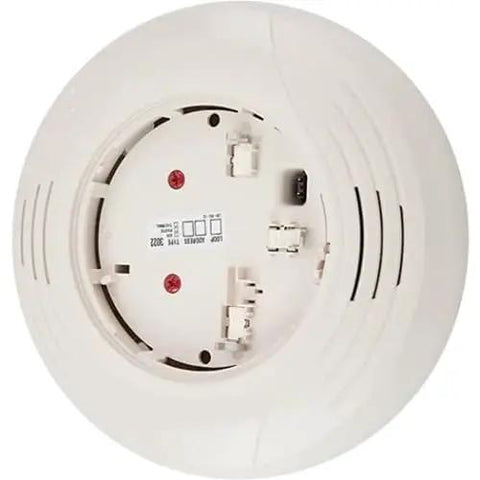 No Fuss Retrofit Ready Intelligent Sounder Base In Elegant Ivory, showing back view with connections for fire alarm systems.