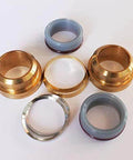 Waterjet pump seal kit: brass bushings and gray rubber seals, six pieces.