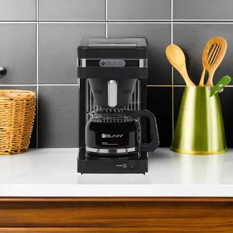 Speed Brew Elite 10 Cup Coffee Maker With Internal Stainless Steel 70 Oz Hot Water Tank Quick Brew Technology on kitchen counter