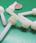 Knurled Slotted Head Thumb Screws Natural Color 10-32 Thread 1.00 Inch Length 100 Pack scattered on green surface
