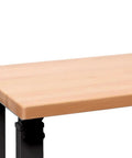 Side view of UltraHD Heavy Duty Workbench Table With Solid Wood Top 1000 Lbs Capacity Ideal Garage Workshop And Warehouse Desk Graphite Finish 72 W 25 D 28.5 To 42 H Adjustable Height showing the edge of the wood top and part of the black metal frame.