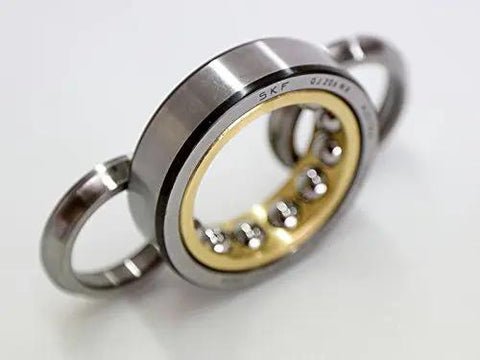 Heavy Duty Single Row Angular Contact Ball Bearing Built Tough With 35 Degree Contact Angle And Solid Brass Cage For Rock Solid Thrust Handling And Crisp Rotation At 170 Millimeter Bore With 360 Outer Diameter showing brass cage and smooth finish.