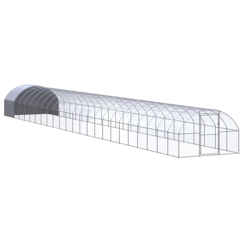 Long greenhouse structure with arched roof and transparent walls, showcasing a potential design for the spacious outdoor chicken coop.