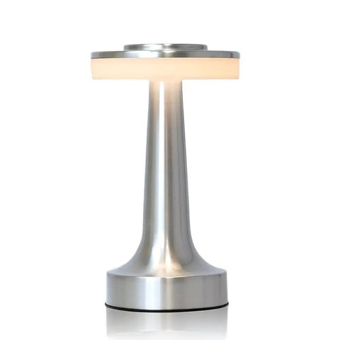 Sleek Silver LED Table Lamp with touch sensor and rechargeable design, part of Cordless Metal Desk Lamp With Touch Sensor And 3 Color Temperature Modes, 3 Brightness Levels, Rechargeable Bedside Night Light For Kids Nursery And Dining Room series.