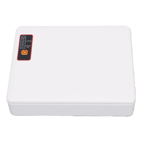 Compact Mini Ups Battery Backup For Home Routers Modems Offering 12000Mah Capacity And 18W Clean Output Top view with indicator lights.