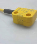 Yellow RFID Safety Switch With Coded 11 mm Actuation, Two Safe Semiconductor Outputs, 24 VDC Power, 5 Pin M12 Connector, IP67 Rated, One Piece