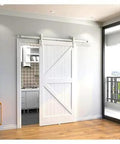 Heavy Duty Double Bypass Sliding Barn Door Hardware Kit With Low Profile Flat Track System in modern kitchen setting.