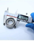 Premium Built Tough CSK Sprag Free Wheel One Way Clutch Bearing Assembly 20x42x14mm measured with caliper for precise dimensions.