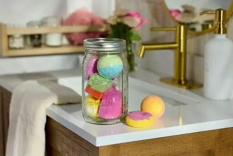 Real Deal Wide Mouth Glass Mason Jars With Lids And Bands For Canning And Pickling Quart 32 Oz Pack Of 2 featuring colorful bath bombs.