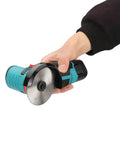 Hand holding angle grinder with Three Inch HSS Circular Saw Blade With Three Eighth Inch Arbor 72 Tooth Multi Material Cutter