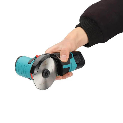 Hand holding angle grinder with Three Inch HSS Circular Saw Blade With Three Eighth Inch Arbor 72 Tooth Multi Material Cutter