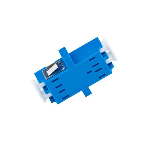 Blue plastic PC component with white end caps, vent slots and a metal latch, side view