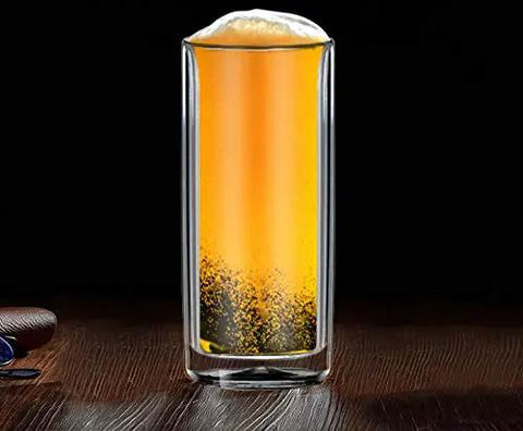 Slick Double Wall Insulated Glass Tumbler Set Featuring 16 Oz Collins Style Highball Cups with craft beer served in a clear glass.