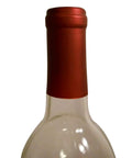 Premium Heat Shrink Wine Bottling Caps 100 Pack Matte Oriental Red covering a wine bottle neck with a satin finish.