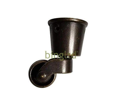 Top Shelf Heavy Duty Swivel Antique Brass Furniture Casters With Slick Round Cup Base Offering Hella Smooth 360 Rotation And Rock Solid Performance For Every Home Upgrade. Close-up of antique brass caster with round cup base.