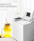 Premium Stainless Steel Freestanding Ice Maker Cranks Out Thirty Three Pounds Bullet Ice Daily With Slick Touch Panel, filled with ice.