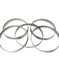 Premium M42 Bandsaw Blades 5 Pack Built Tough For Real Woodworkers Featuring A Sharp 10 Degree Hook And 1.15T Thickness stacked together, showcasing their bimetal construction.
