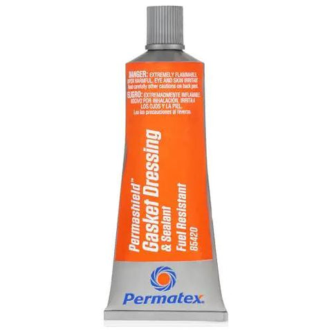 Front view of Fuel-Resistant Gasket Dressing And Sealant, Orange, 2 Oz Tube, Flexible At High Temps, with gray cap.