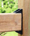 Top Shelf Heavy Duty Privacy Fence Brackets For Standard 2x4 Wood Railings Pre Drilled Galvanized Steel 8 Pack installed on wood post.